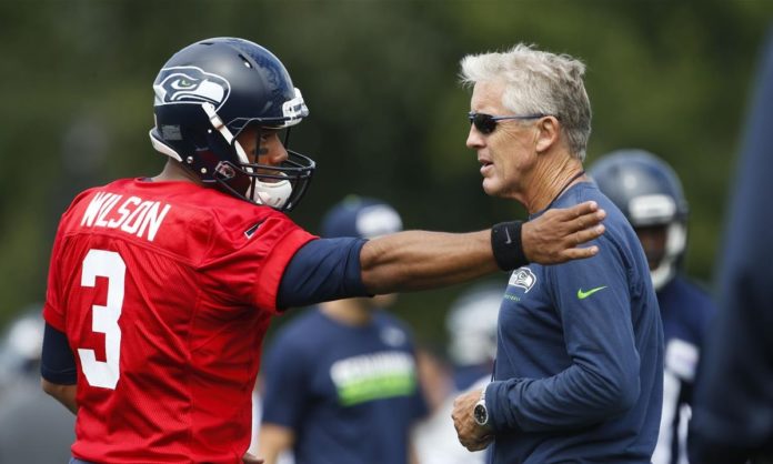 Russell Wilson and Pete Carroll chicago bears draft plans