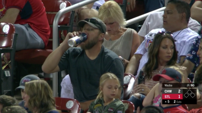 Mark Buehrle at white sox game drinking beer