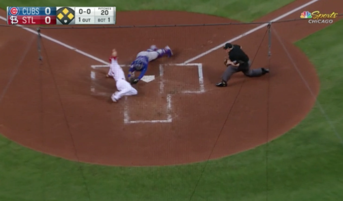 Kyle Schwarber throws out Matt Carpenter