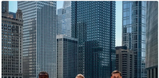 Members of the Fighting Illini pose for a picture in Downtown Chicago
