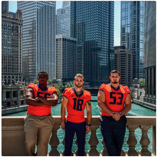 Illini Members of the Fighting Illini pose for a picture in Downtown Chicago