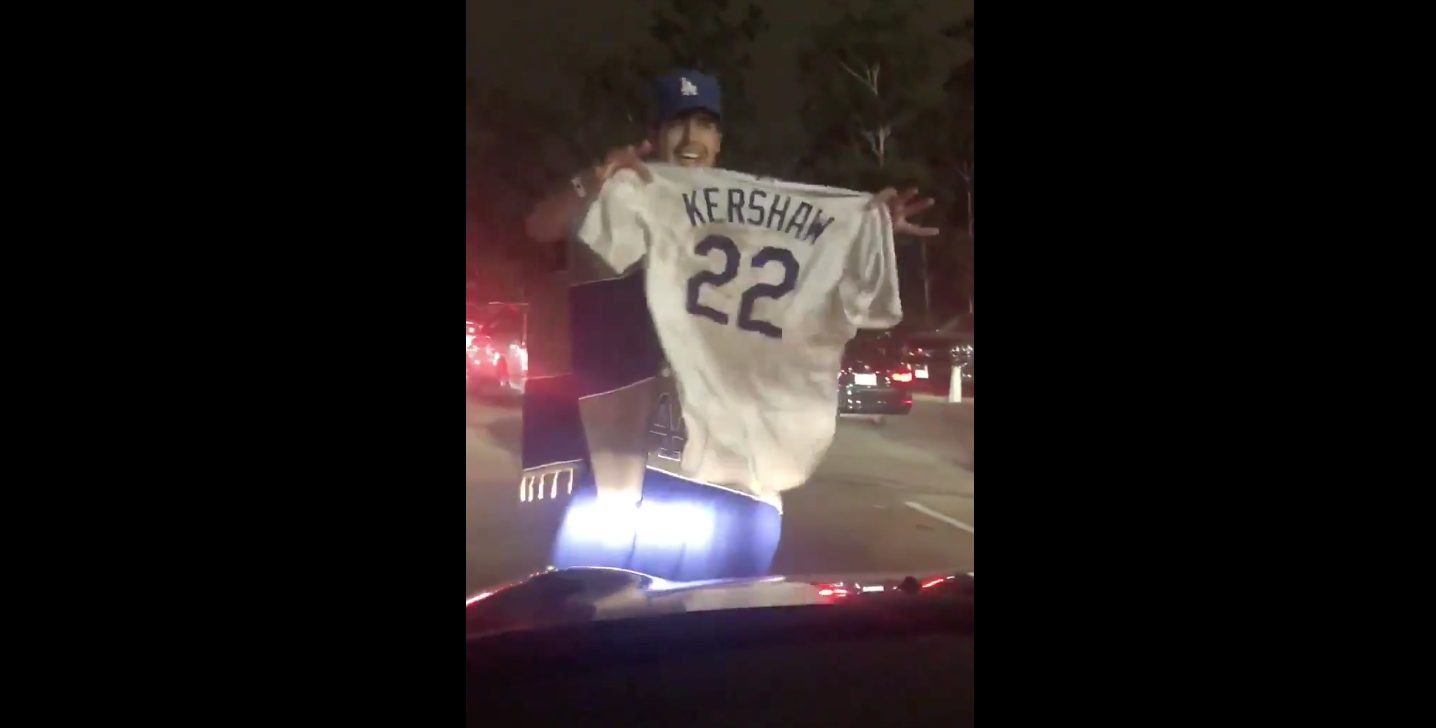 WATCH: Dodgers Fans Are Running Over A Clayton Kershaw Jersey With